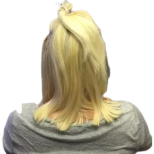A woman with tied blonde hair